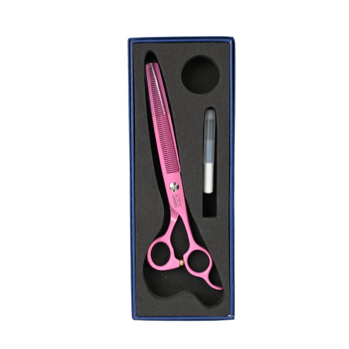 sharp grooming scissors, titanium edge scissors, close-up grooming blades, thinning shears detail, sw51275 pink shears, grooming scissors in use, swan scissors grooming, dog grooming shears in action, thinning scissors for pets, pink swan scissors,